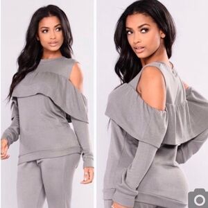 Mona B cold shoulder ruffle top. Size Medium